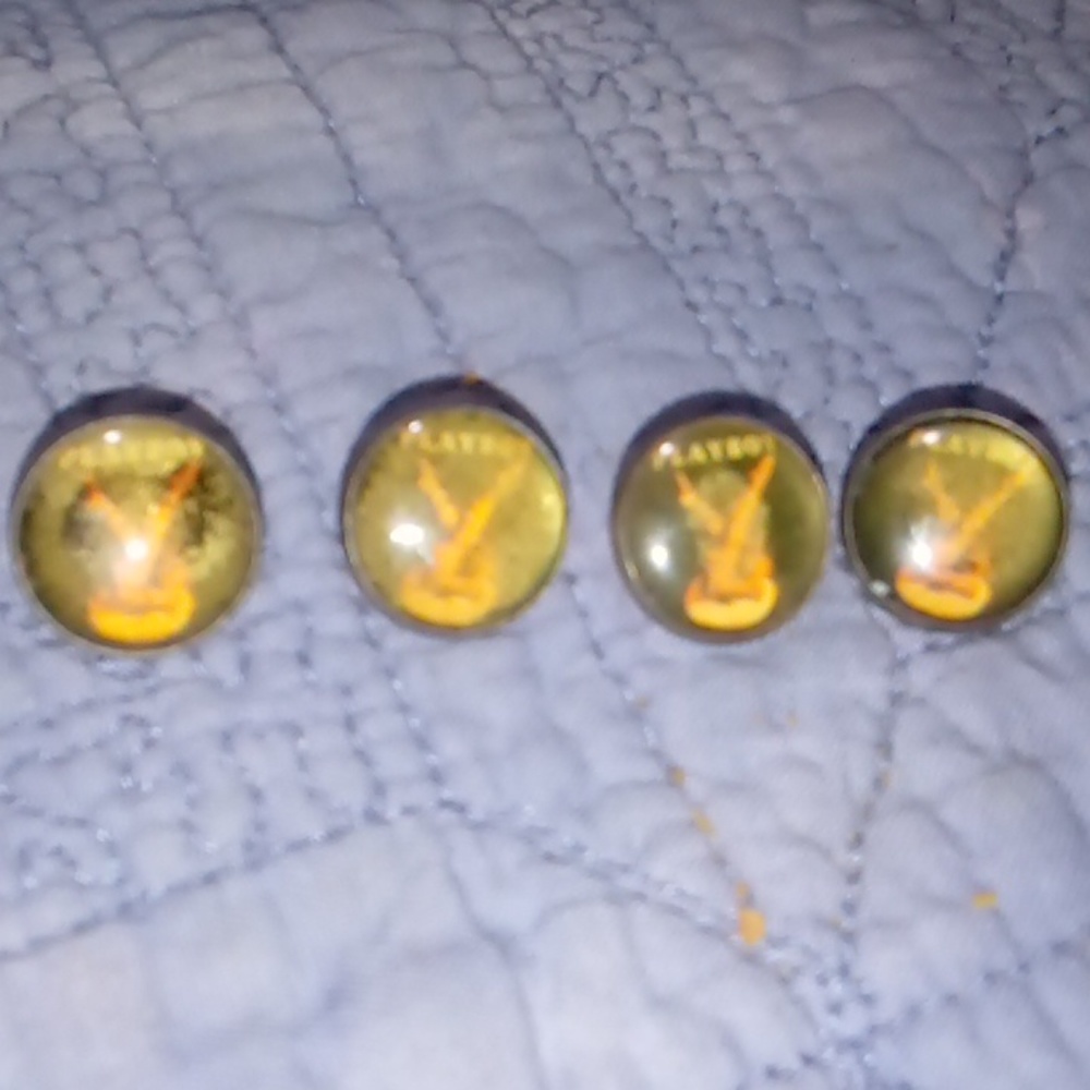 I have 4 vintage playgirl buttons